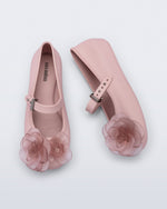 Side and top view of a pair of beige Soft Ballerina Petals kids flats with clear pink flowers