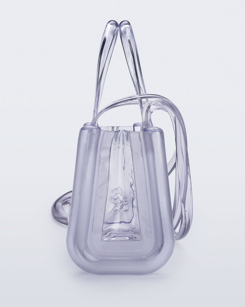 Side view of the clear Small Jelly Shopper x Telfar bag