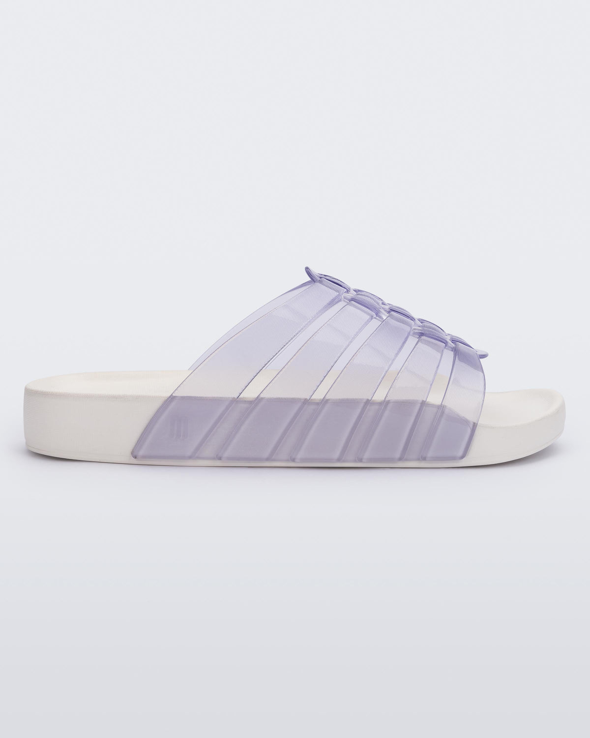 Side view of a clear Possession Slide with white sole