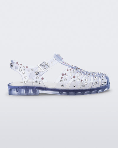 Side view of a clear Possession Crystals sandal