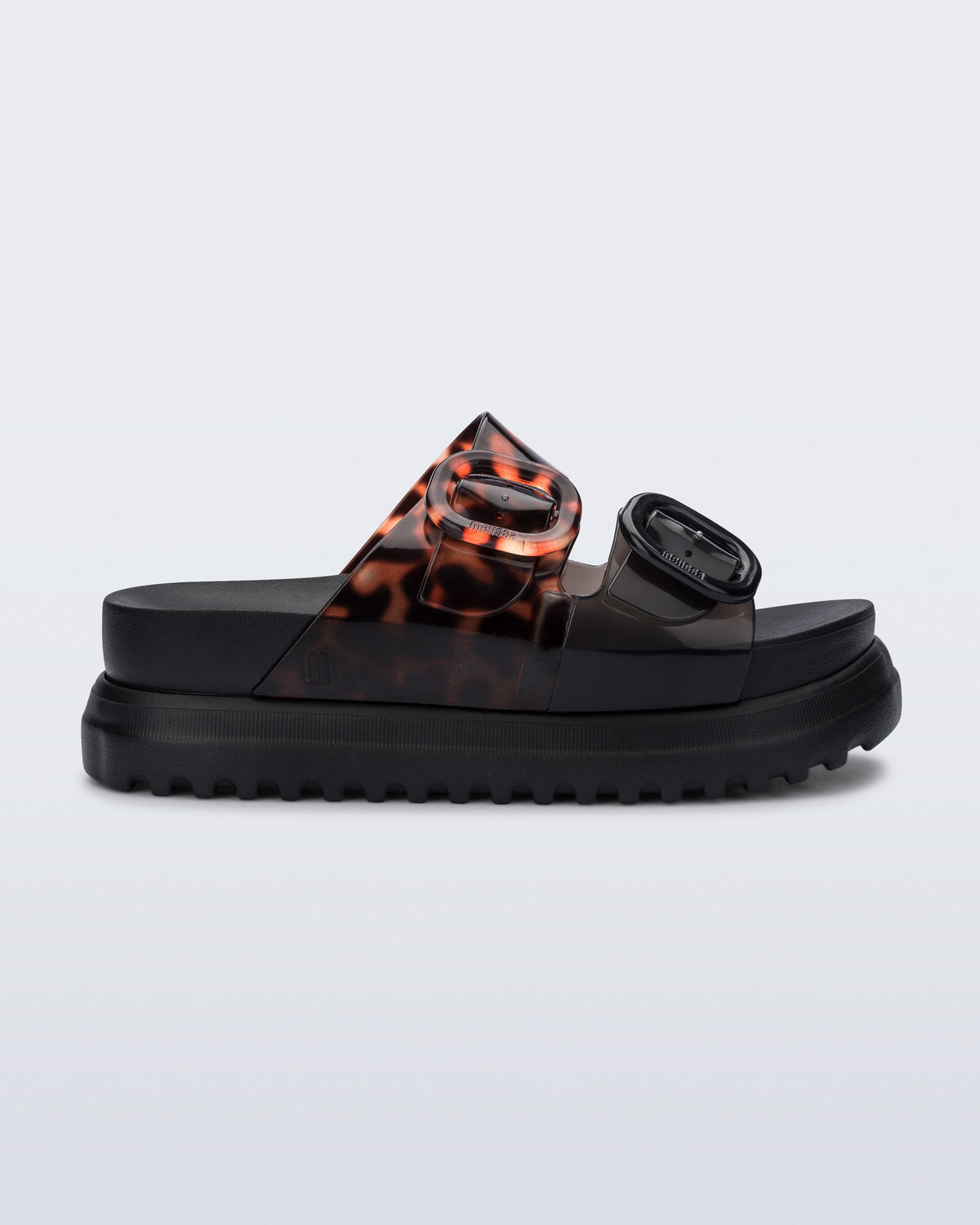 Side view of a black Cozy Platform with Tortoise straps