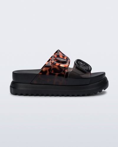 Side view of a black Cozy Platform with Tortoise straps