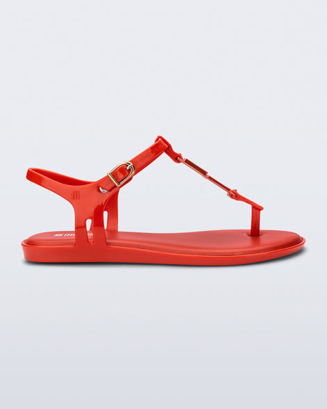 Side view of a red Solar M Chic sandal