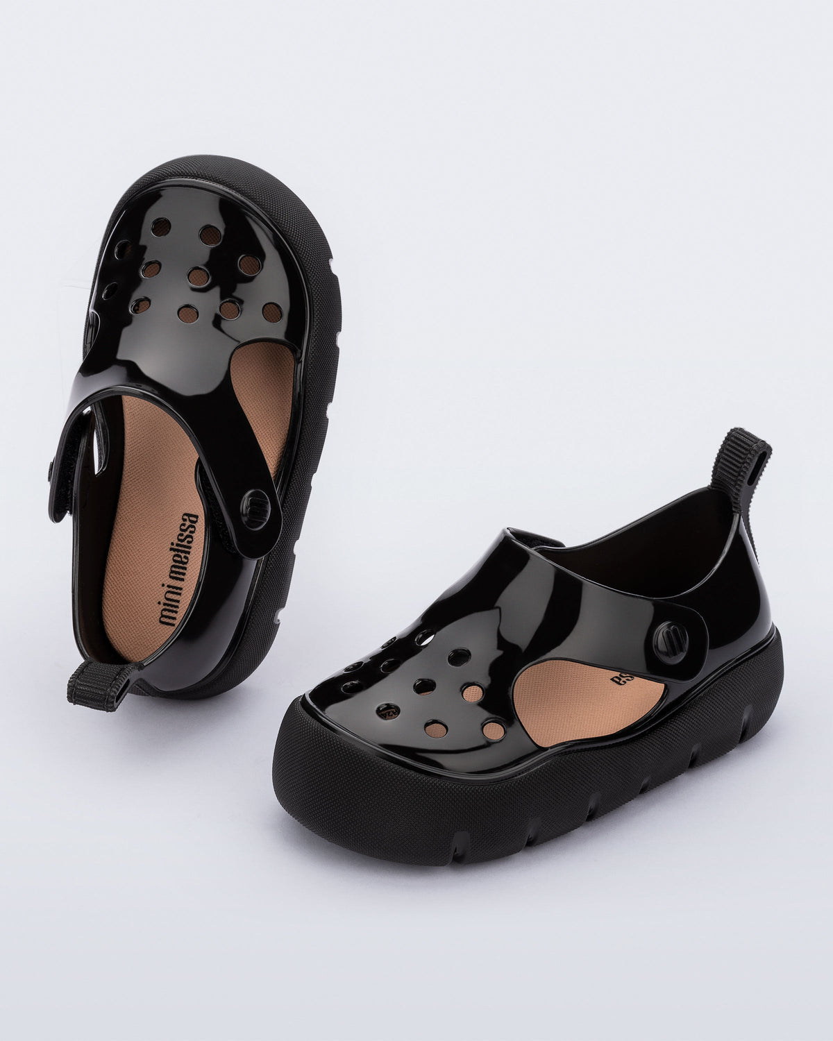 Top and angled view of a pair of black Bowie baby sandals.
