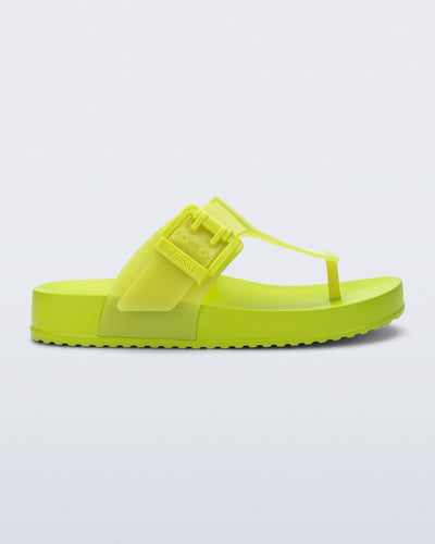 Side view of a green Cozy Flip flop
