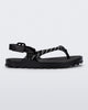 Side view of a black Bond sandal with textile strap and black toe piece