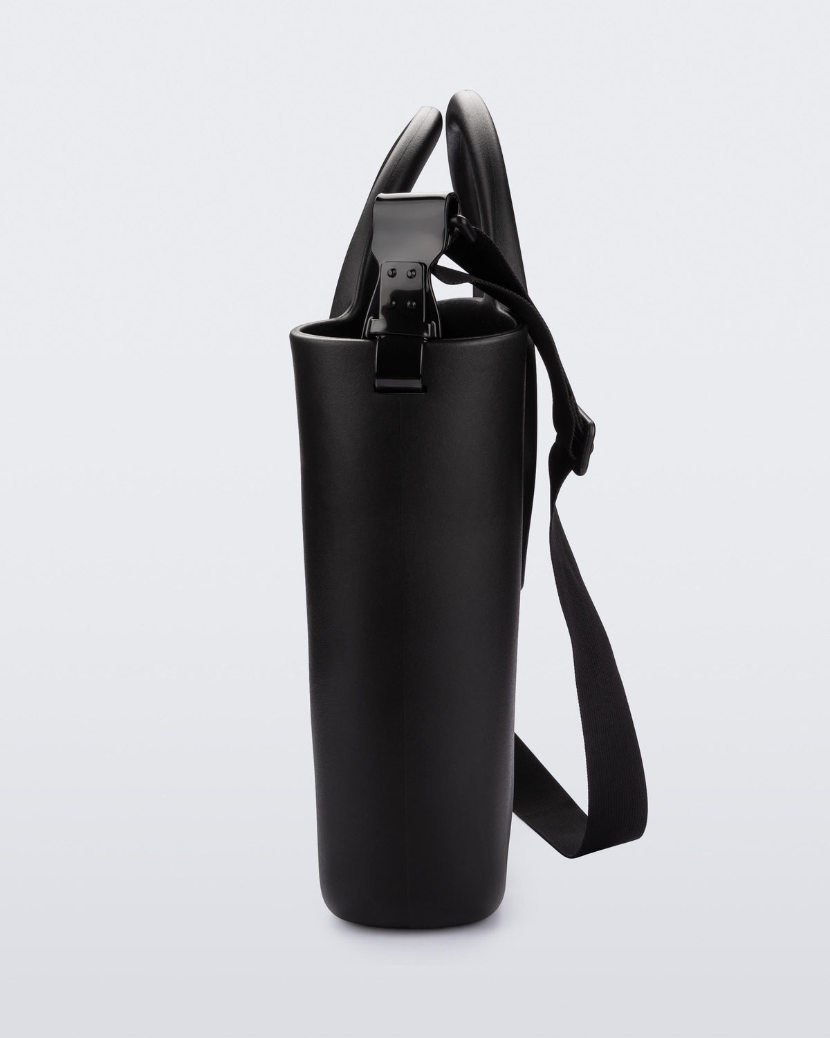 Side view of a black Free Big Bag with handles and a strap