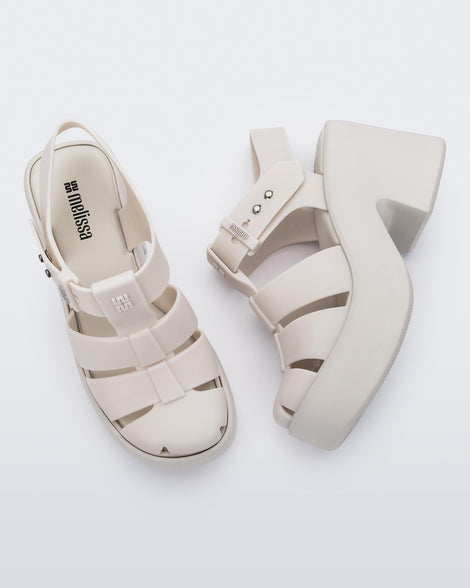 Top and side view of a matte beige Lulu platform heel sandals