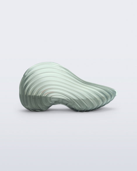 Side view of a transparent green Sneaker + Diesel