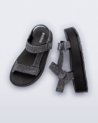 Top and side view of a pair of black jean Flowing Denim platforms