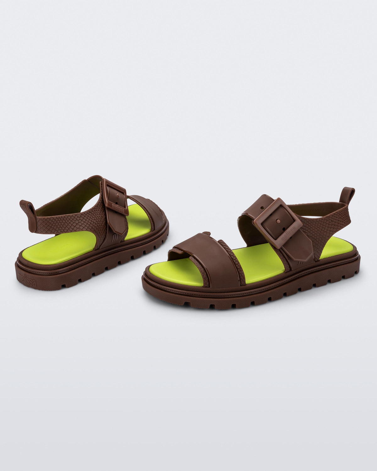Angled view of a pair of brown Connection Papete sandals
