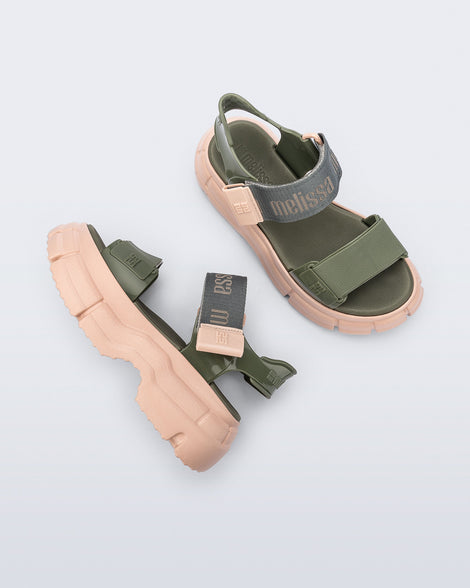 Top and side view of a pair green Pulse platform sandals with straps and pink sole