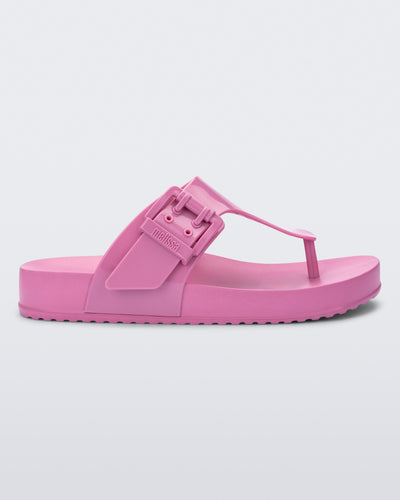 Side view of a pink Cozy Flip flop