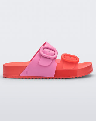Product element, title Cozy in Red/Pink
 price €55,00