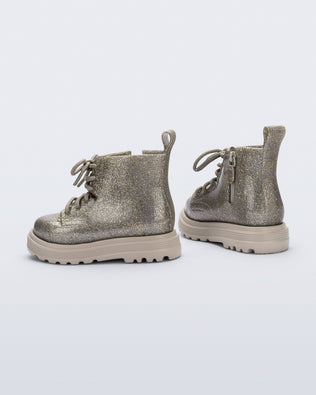 Product element, title Coturno in Beige/Golden Glitter
 price €89,00