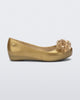 Side view of a glitter beige kids Ultragirl Springtime flats