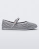 Side view of a silver glitter Harper flat with strap