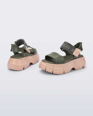 Back and side view of a pair green Pulse platform sandals with straps and pink sole