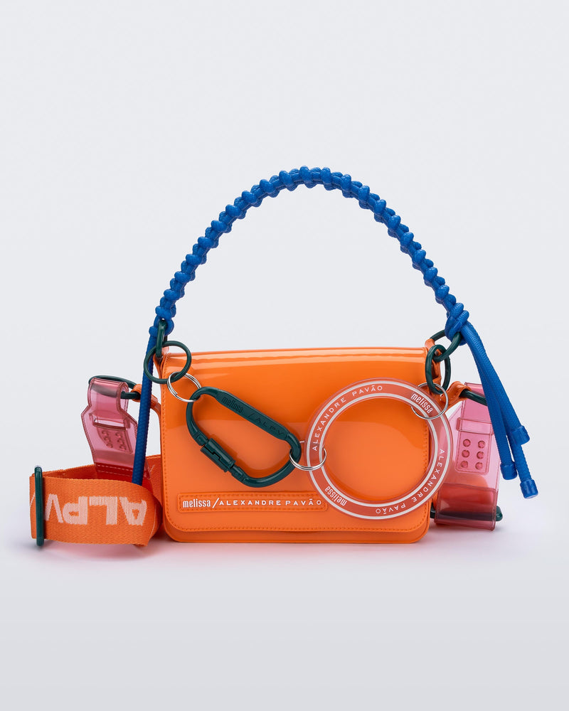 Front view of an orange Olga Bag + Alexandre Pavao with blue short strap fabric long  strap