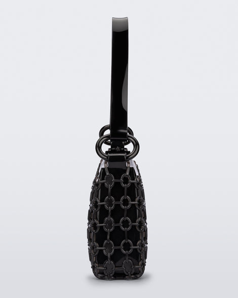 Side view of a black Hoop bag with short shoulder strap