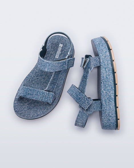 Top and side view of a pair of blue jean Flowing Denim platforms
