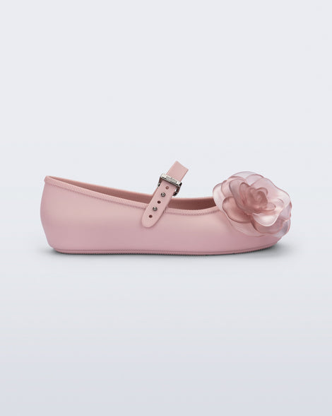 Side view of a pink Soft Ballerina Petals kids flat with clear pink flowers