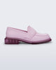 Side view of a pink Spencer loafer with clear pink sole