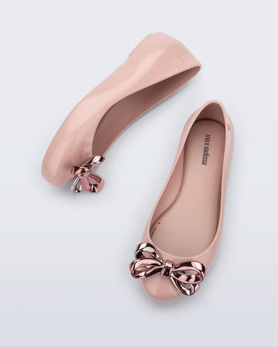 Top and side view of a pair of pink Sweet Love Glam kids ballerina flats with bow