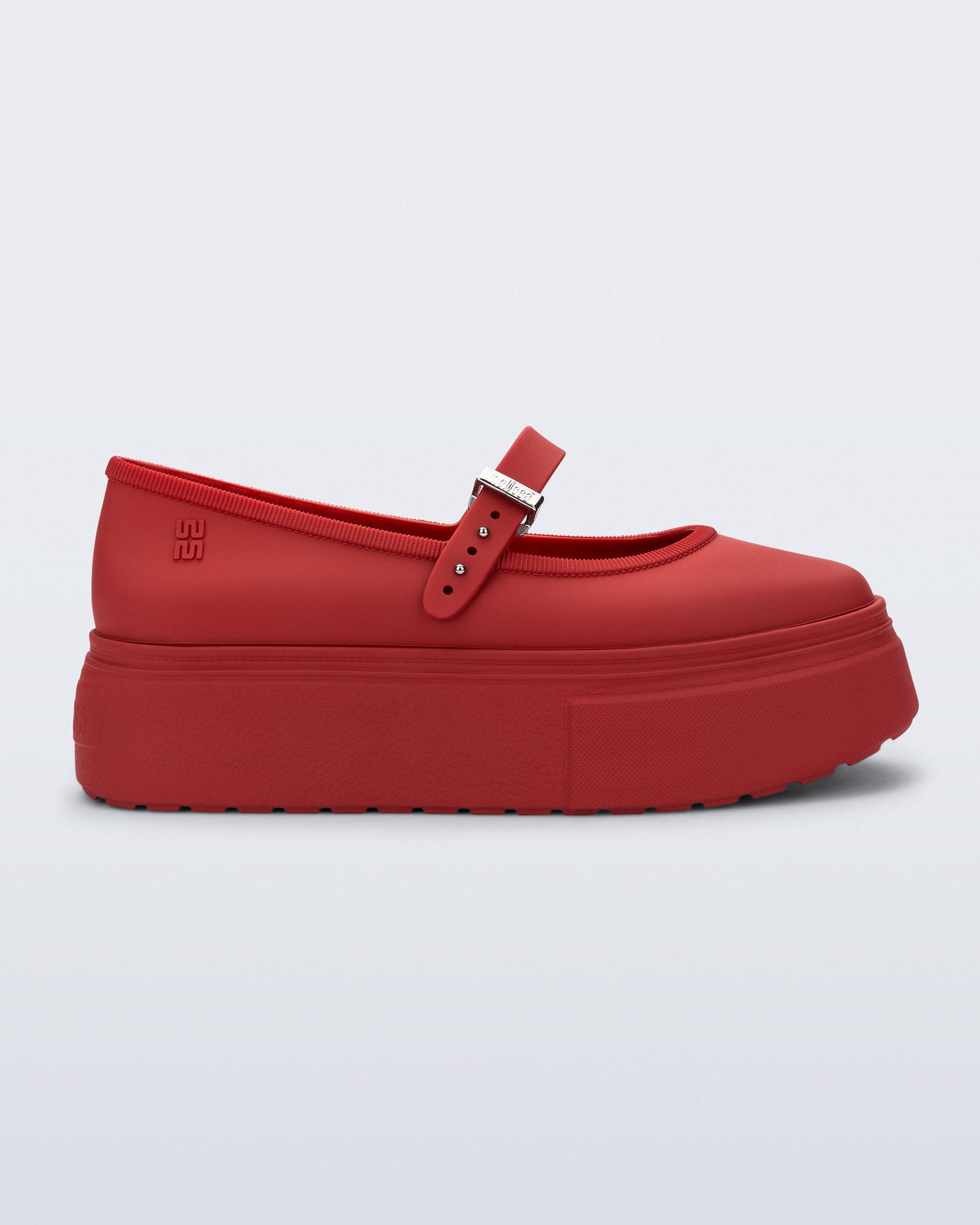 Side view of a red Soft Ballerina Platform flats