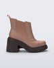 Side view of a brown Courtney boot with dark heeled sole