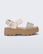 Side view of a beige/glitter Kick Off Sandal