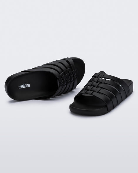 Top and angled view of a pair of black Possession Slide