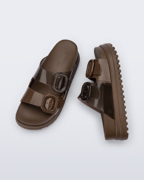 Top and side view of a pair of brown Cozy Platform slide sandals with two buckle straps.