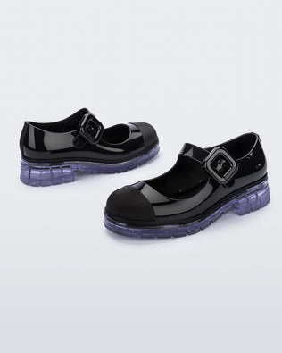 Product element, title June in Black/Clear
 price €89,00