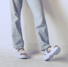 model wearing the new light blue kick off sandal