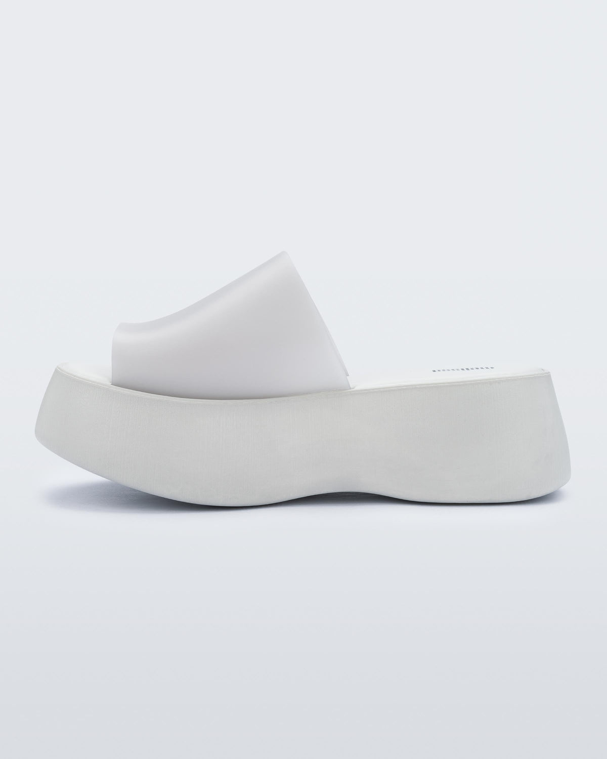 Inside view of a white Melissa Becky platform slide. 