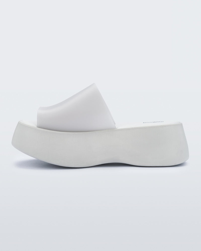 Inside view of a white Melissa Becky platform slide. 